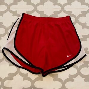 Red Nike shorts